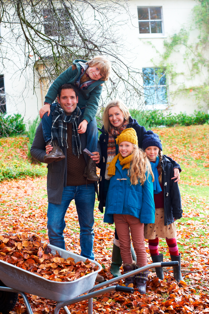 Family smiling together outdoors